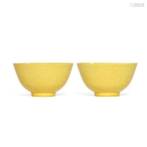 A pair of yellow-glazed 'dragon and phoenix' bowls, ...
