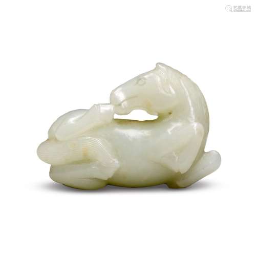 A pale celadon jade carving of a horse, Qing dynasty, 18th c...