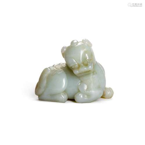 A small pale celadon jade figure of a lion, Qing dynasty, 18...