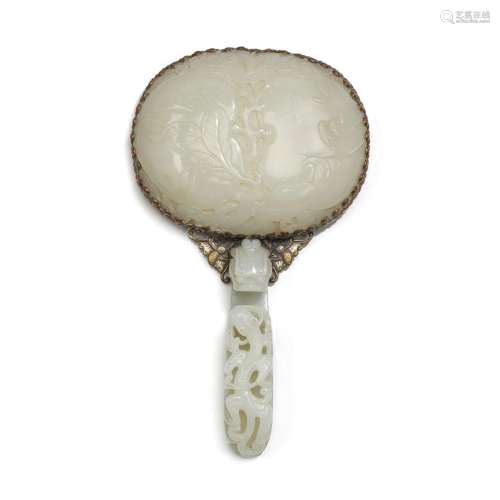 A pale celadon jade-embellished hand mirror, Qing dynasty, 1...