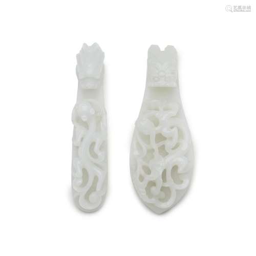 Two pale celadon jade 'dragon' belthooks, Qing dynas...
