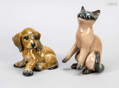 Two animal figures, sitting dachshun