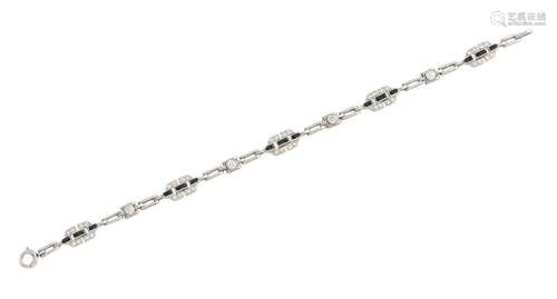 PLATINUM, DIAMOND AND ONYX BRACELET, CIRCA 1925