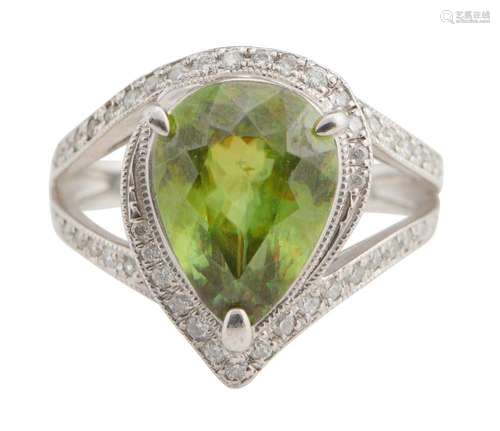 PLATINUM, PERIDOT AND DIAMOND RING