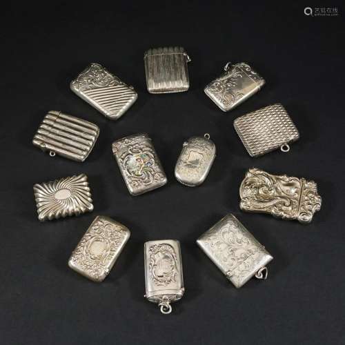 12 silver matchboxes, different periods