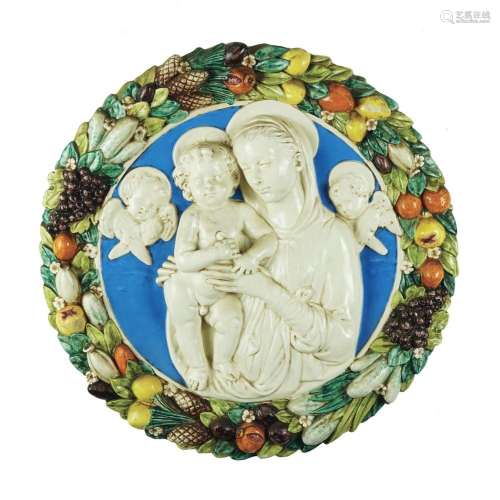 An Italian white and polychrome ceramic rould plate, Sesto F...