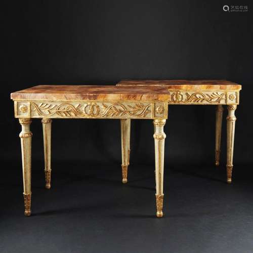 A pair of lacquered and gilt wood consoles with faux marble ...