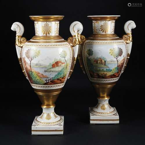 A pair of white, polychrome and gilt porcelain vases