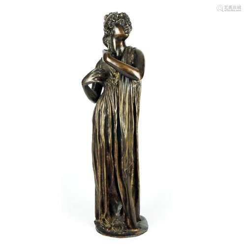 A patinated bronze figure of a vestal