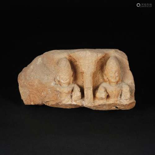 An antique carved pink stone high-relief with 2 goddesses