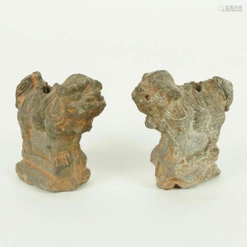 A pair of antique clay figures of a Phoo dog