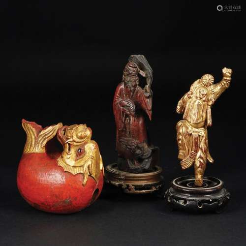 3 Chinese polychrome and gilt wood figures of an animal and ...