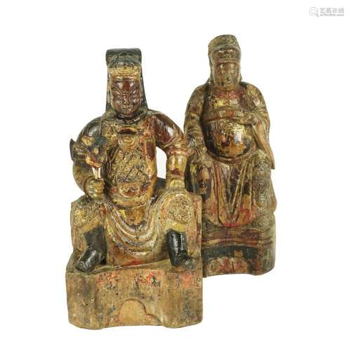 2 Chinese polychrome and gilt wood figures of a sitting divi...