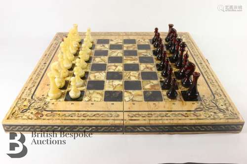 A Russian Emelyanov Amber luxury chess set 'Arabesque Tina'