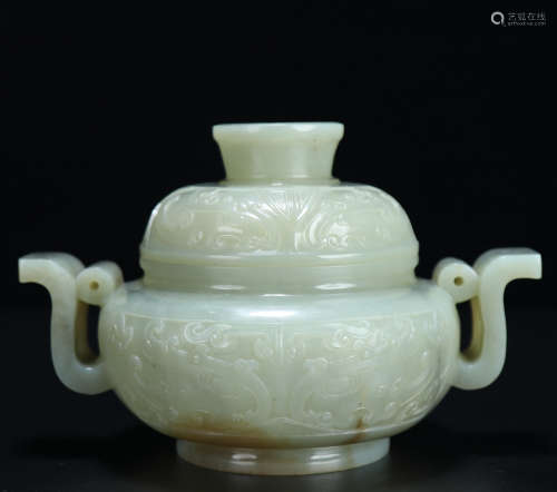 An old collection of Hetian jade taotie pattern double-eared...