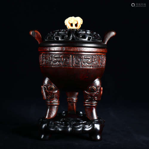 An old collection of red sandalwood three-legged incense bur...