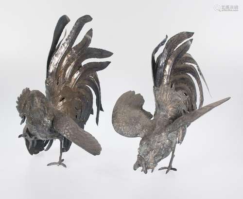 Pair of large embossed and chased silver roosters. Colonial ...