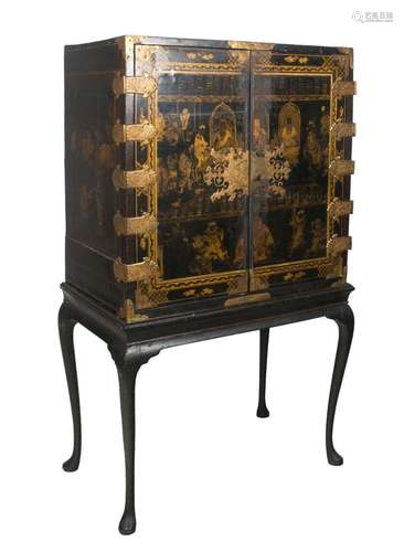 Lacquered wooden cabinet with gilded iron fittings. China. 1...