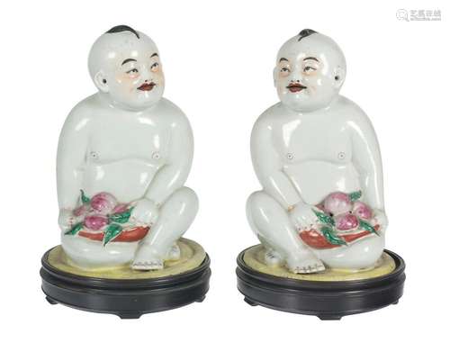 Pair of Chinese porcelain buddhas made for exportation. Fami...