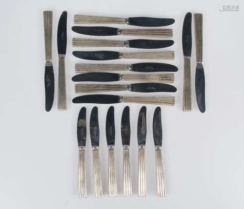 Set of 12 marked silver dining knives and 12 dessert knives....