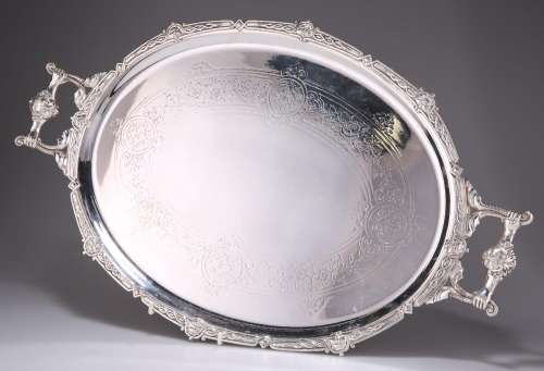 A VICTORIAN SILVER-PLATED TWO-HANDLED TRAY