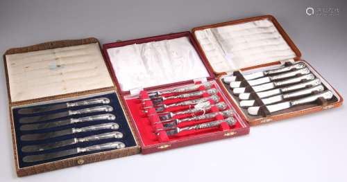 TWO SETS OF SIX SILVER-HANDLED TEA KNIVES AND A SET OF SIX S...
