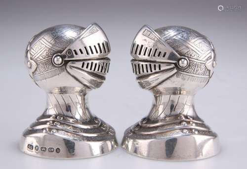 A PAIR OF VICTORIAN SILVER NOVELTY KNIGHT'S HEAD PEPPER POTS