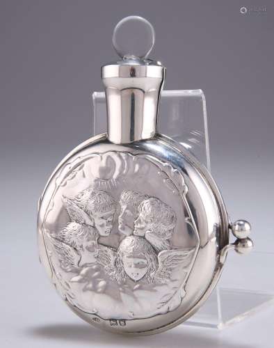 A LATE VICTORIAN SILVER CASED SCENT BOTTLE