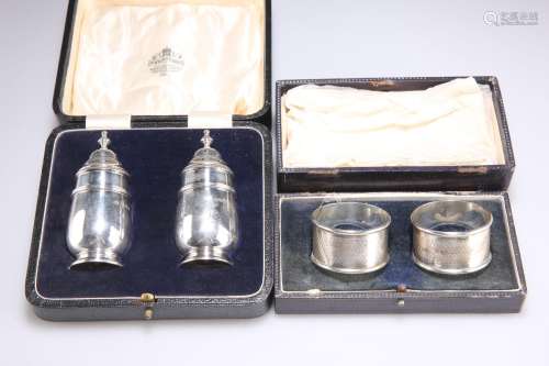 A PAIR OF GEORGE V SILVER PEPPER POTS