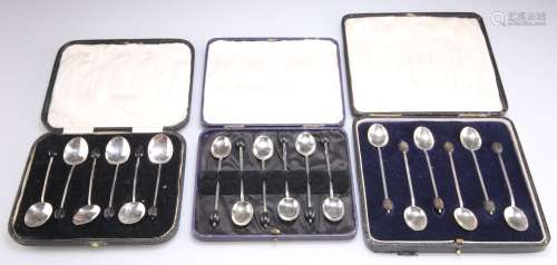 THREE CASED SETS OF SIX SILVER COFFEE BEAN SPOONS