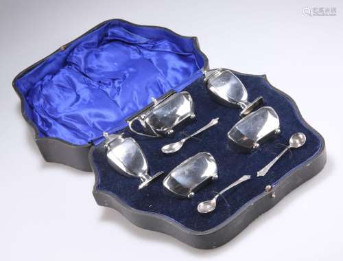 AN EDWARDIAN CASED SILVER CONDIMENT SET