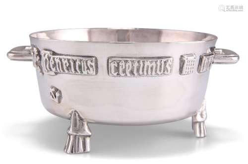 AN ARTS AND CRAFTS SILVER BOWL MODELLED AS THE WINCHESTER BU...