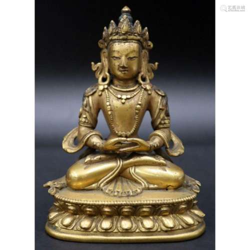 Gilt Bronze Seated Figure of Buddha Shakyamuni.