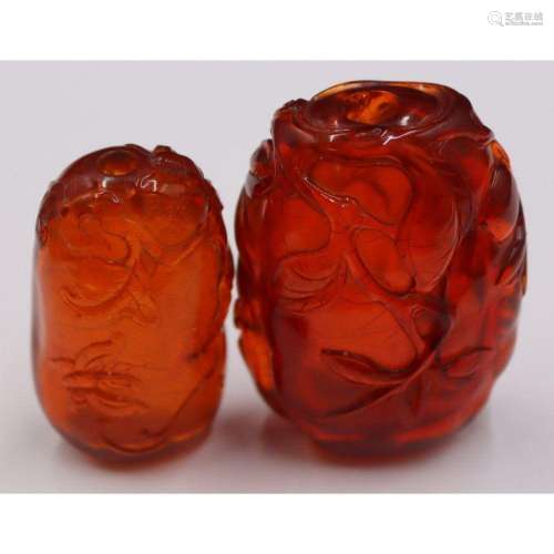 (2) Chinese Carved Amber Snuff Bottles.