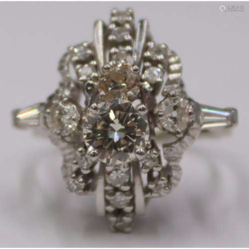 JEWELRY. 18kt Gold and 0.89 Diamond Cluster Ring.