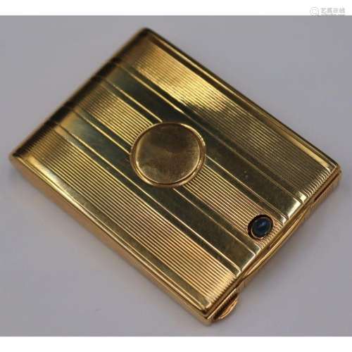 GOLD. Cartier 18kt Gold and Sapphire Hinged Case.
