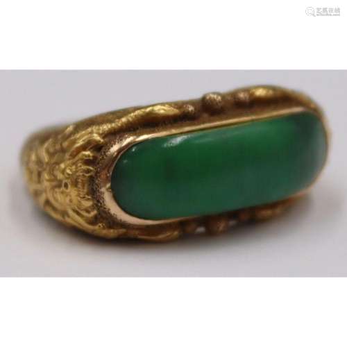 JEWELRY. 14kt Gold and Jade Saddle Ring.