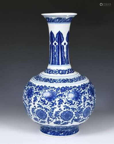 A Chinese blue and white bottle vase, decorated flowers in u...