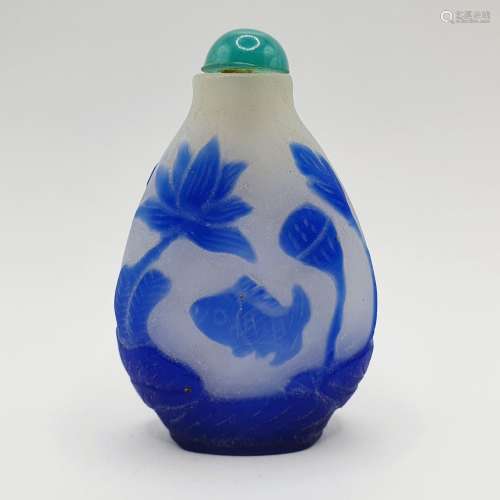 A Chinese blue and white cased glass snuff bottle, 7 cm high...