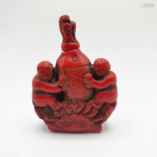 A Chinese red lacquered snuff bottle, 7 cm high Provenance: ...