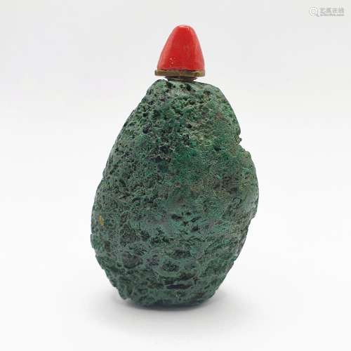 A Chinese green stone snuff bottle, 7.5 cm high Provenance: ...