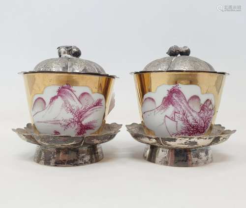 A pair of Chinese gilt cups, with shaped cartouches decorate...