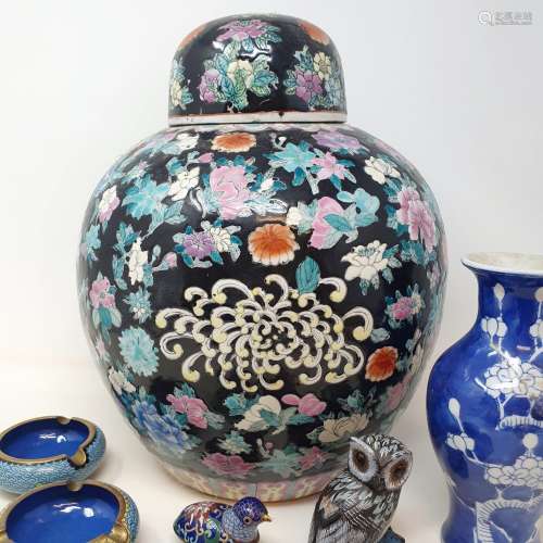 A Chinese ginger jar and cover, decorated flowers, 36 cm hig...