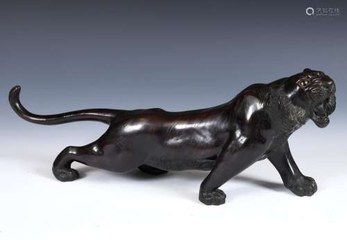 A Japanese bronze tiger, character mark to base, Meiji perio...