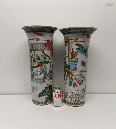 A pair of Chinese famille verte cylinder vases, decorated la...