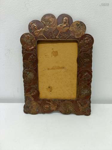 A Japanese bronze picture frame, decorated geisha and blosso...
