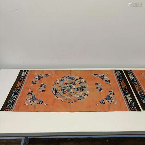 A pair of Chinese silk embroidered panels, 72 x 37 cm, and a...