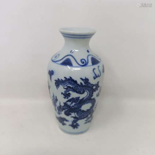A Chinese underglazed blue and white vase, decorated dragon,...