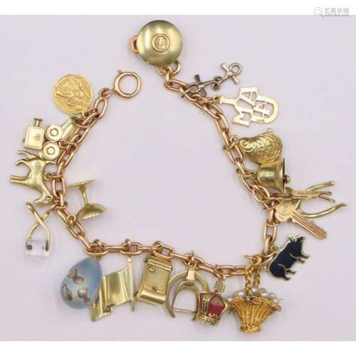 JEWELRY. 14kt Gold Bracelet with (20) Gold Charms.