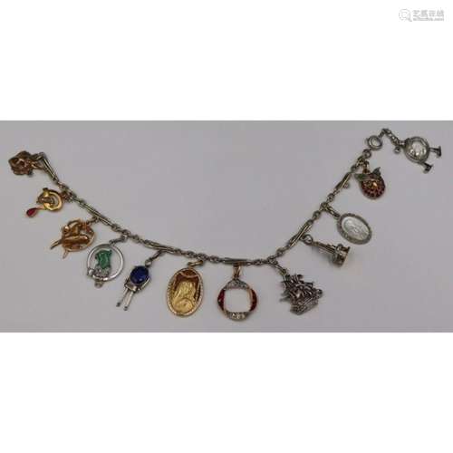 JEWELRY. Exceptional 14kt Gold Charm Bracelet with